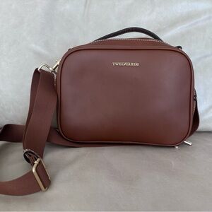 TWELVELITTLE Diaper clutch in toffee